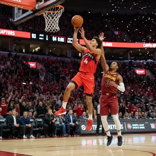 Scottie Barnes driving to the basket during a competitive playoff basketball game