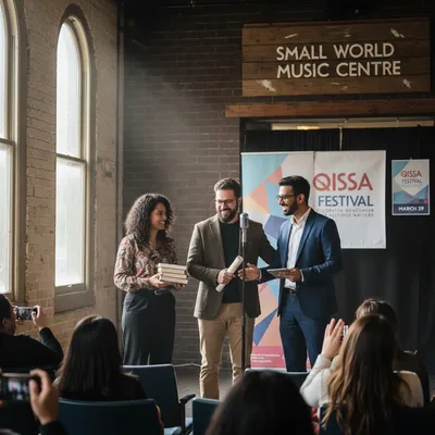 Festival hosts and performers gather at the Small World Music Centre for the Qissa Festival.